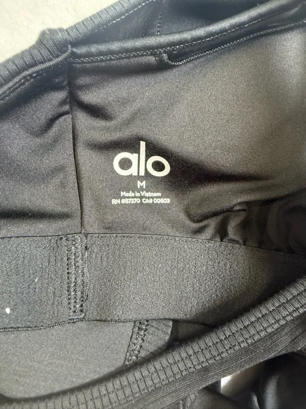 ALO Yoga Black Airlift Ribbed Enchanted Sports Bra with Subtle Branding - Picture 2 of 6